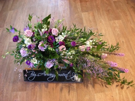 Single ended funeral spray ( shades of purple)