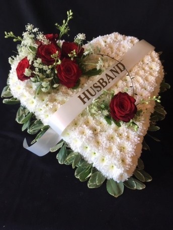 Red rose funeral heart