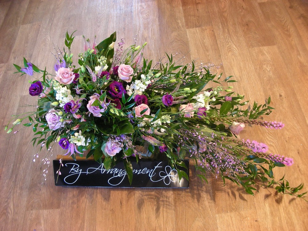 Single ended funeral spray ( shades of purple)