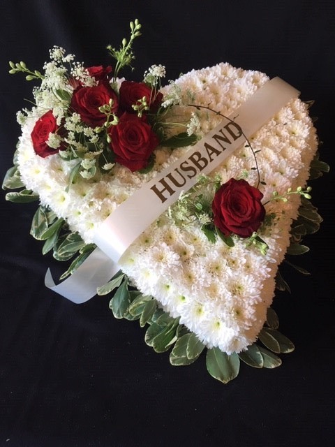 Red rose funeral heart